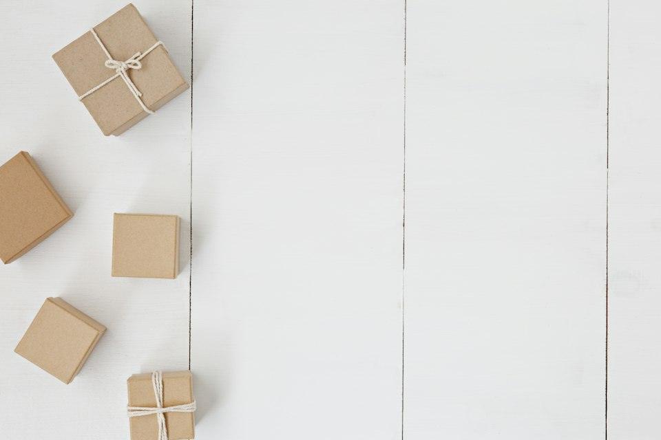 Brown gift box on white surface