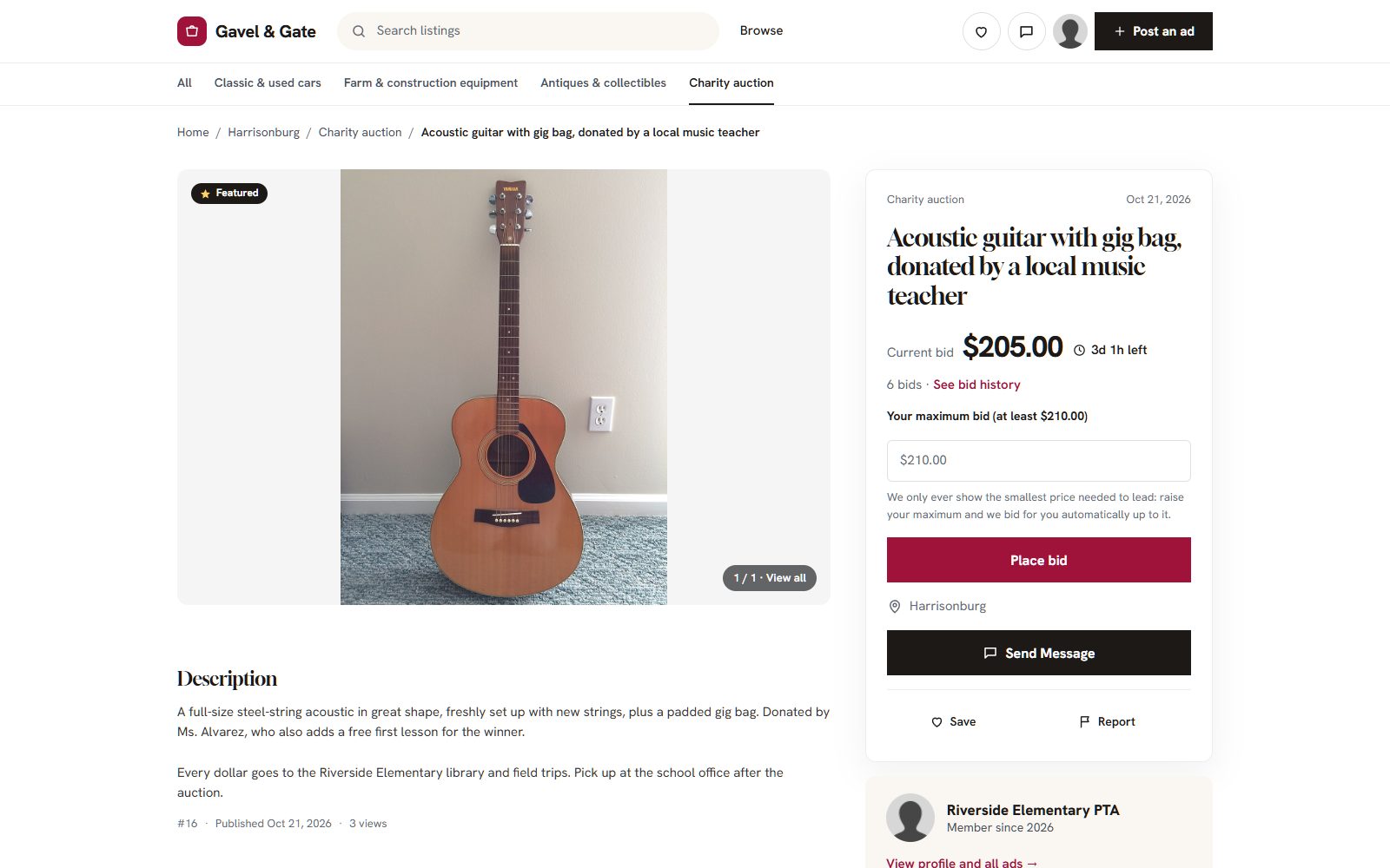 A donated guitar in a school's charity auction, with the current bid and countdown